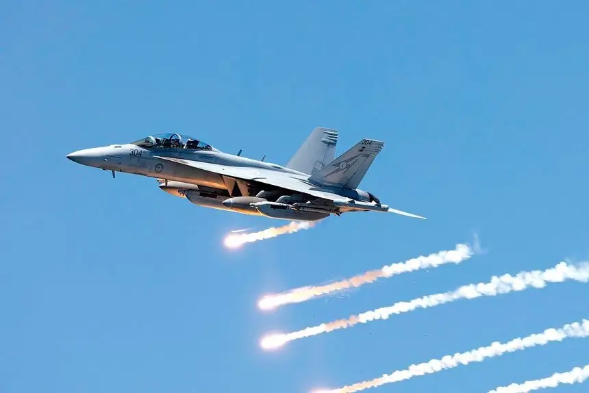 An Air Force EA-18G Growler aircraft dumps flares during a display  during the Newcastle Williamtown Air Show last year. Photo by: FSGT Ricky Fuller