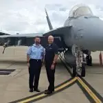 RAAF Group Captain Alexander McCreath, (left) and Chris Grey, Air Combat Electronic Attack Sustainment Program manager for Boeing Defence Australia with an EA-18 G Growler at RAAF Amberley