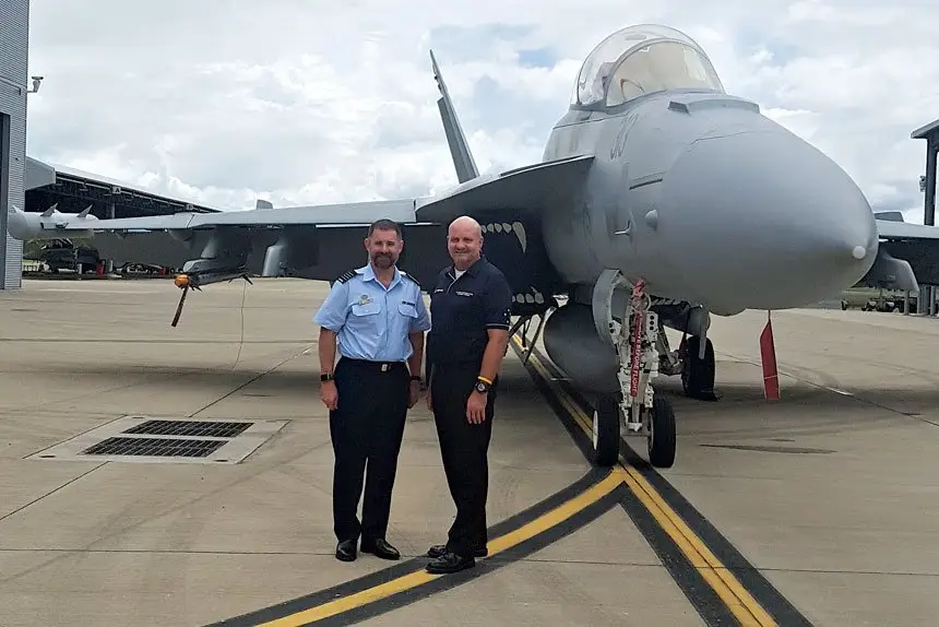 RAAF Group Captain Alexander McCreath, (left) and Chris Grey, Air Combat Electronic Attack Sustainment Program manager for Boeing Defence Australia with an EA-18 G Growler at RAAF Amberley