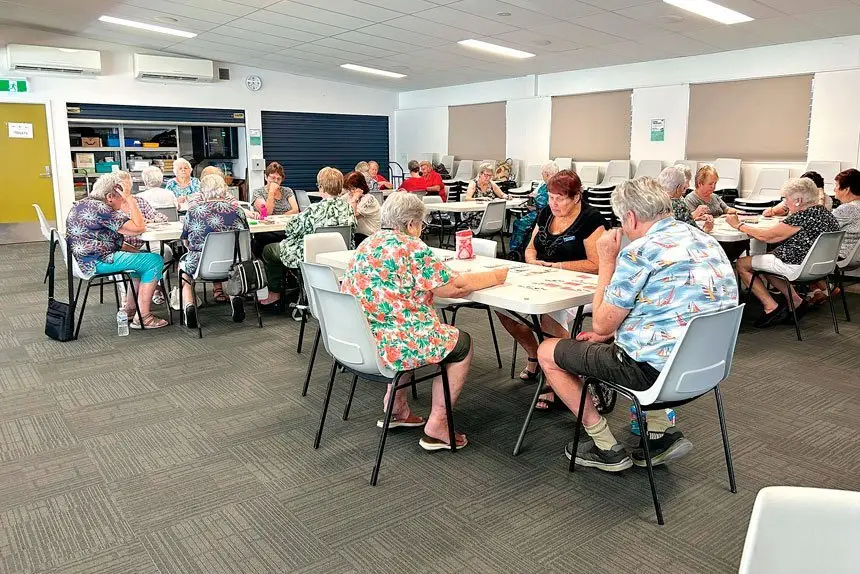 Camira Friends and Neighbours club members play the bingo style card game Hoy. PHOTO: Liz Lister