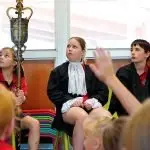 The civic education lessons provide a chance for students to learn about democracy and good government.