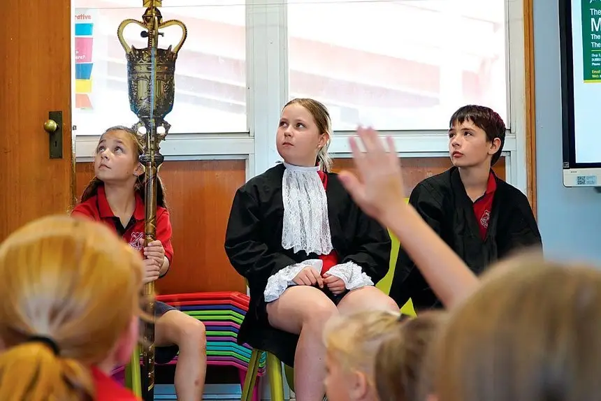 The civic education lessons provide a chance for students to learn about democracy and good government.