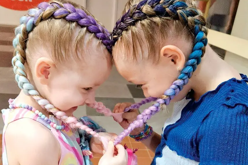 Violet Hohua loves to see the smiles on the faces of girls getting thr hair braided