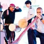 Traditional Bodu Beru drummers, including RAAF Band drummer Corporal Naomi Tan, accompany RAAF didgeridoo player Flight Lieutenant James Evans.
