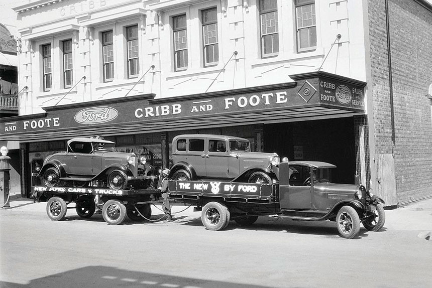 Ford V8 car and truck in front of Cribb & Foote Motor Garage, 144 Brisbane St, IIpswich.