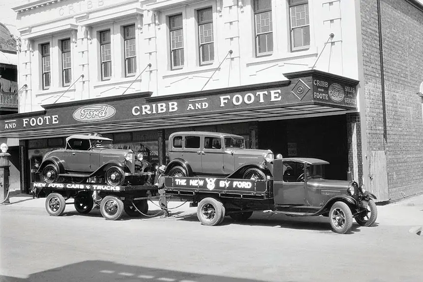 Ford V8 car and truck in front of Cribb & Foote Motor Garage, 144 Brisbane St, IIpswich.