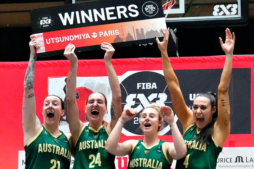 From left, Australia’s Marena Whittle, Anneli Maley, Lauren Mansfield and Alex Wilson celebrate during the women’s 3x3 basketball award ceremony of FIBA Universality Olympic Qualifying Tournament in Japan.