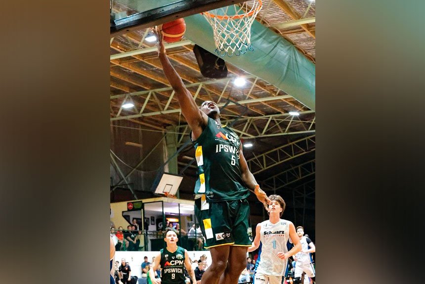 The Ipswich Force’s American big man Henry Pwono goes up for more points.