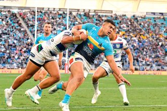 Gold Coast Titans powerhouse David Fifita breaks through flimsy defence in the Round 16 clash against the New Zealand Warriors. PHOTO: AAP Image