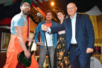 Shayne Neumann with (from left) Ipswich musician Damien Johnson and Banshees Bar & Artspace co-owners Tim Bray and Al Wheeler.