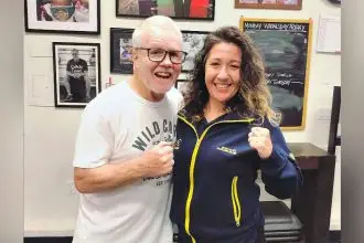 Jessica Cashman with legendary American boxing trainer Freddie Roach.
