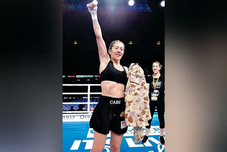 Jessica Cashman celebrates a win in the ring.