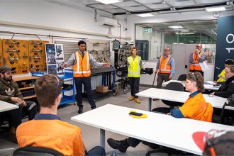 FUTURE FOCUS: Queensland Minister Lance McCallum has encouraging words for apprentices at Bundamba TAFE.