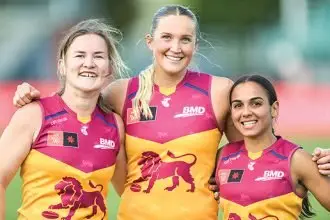 TAYLOR ROARS: Taylor Smith and her Brisbane Lions teammates are ready to defend their AFLW title.