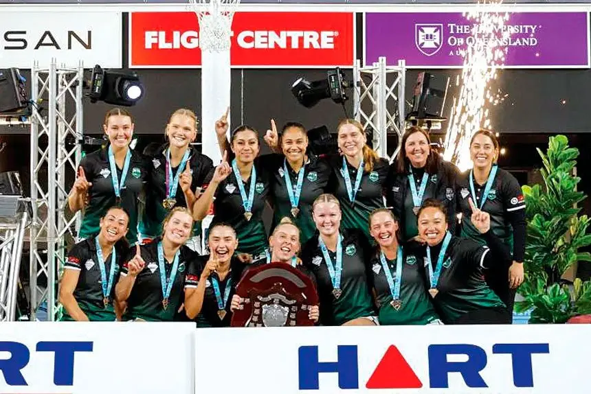 CHAMPION TEAM: The Ipswich Jets celebrate their premiership victory.