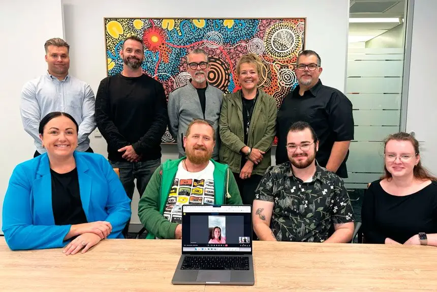 Pictured from left, front row: Nerissa, Michael, Jasper, Carly and Belinda (attending online); back row: Matt, Darren, Mark, Cath and Paul.
