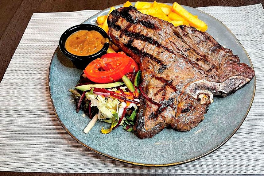 The classic steak and chips is a popular item on the extensive menu.