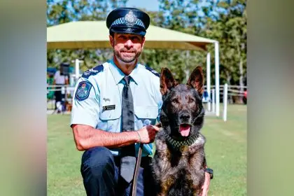 Police dog Kaos receives his Canine Service Medal.