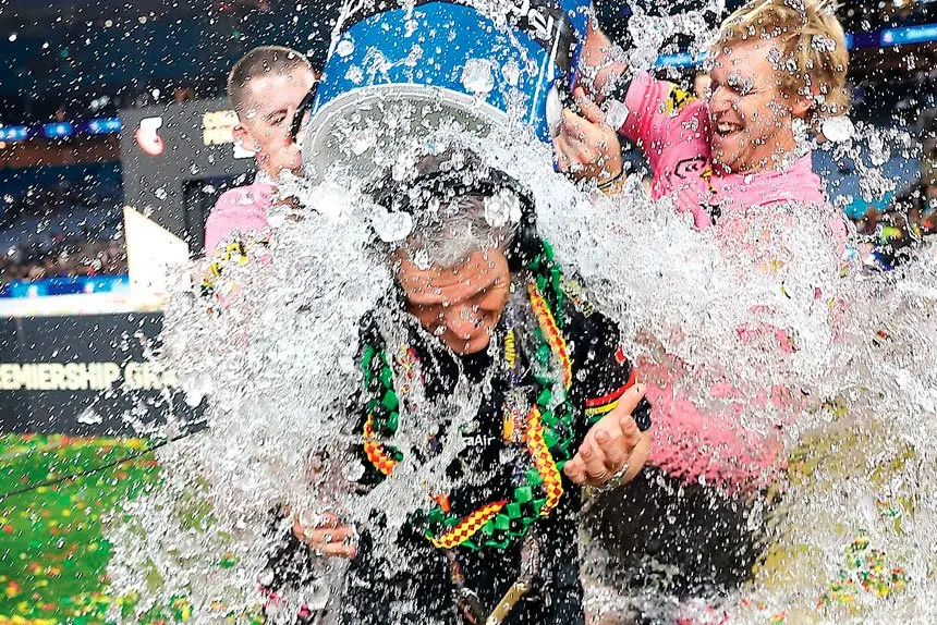 Penrith Panthers coach Ivan Cleary gets a celebratory dunking after his team won the NRL Grand Final over the Melbourne Storm. PHOTO: AAP Image/Mark Evans