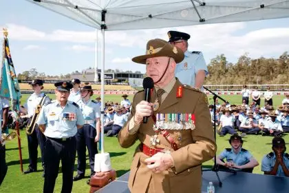 POWERFUL WORDS: Sir Peter Cosgrove speaks at the parade.
