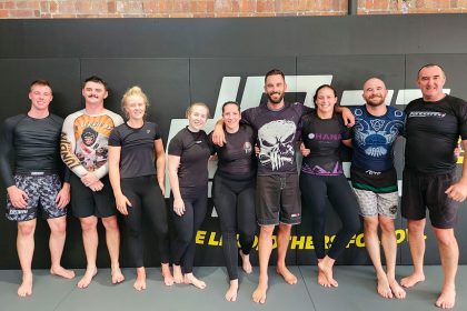The Henrys with members of one of their jiu-jitsu classes.
