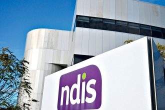 New figures reveal expenses for the NDIS will be $1 billion lower than previously forecast in the Federal Budget. PHOTO: Mick Tsikas/AAP PHOTOS