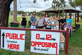 NOT HAPPY: Local residents stand firm in their opposition to the Ebbw Vale development.