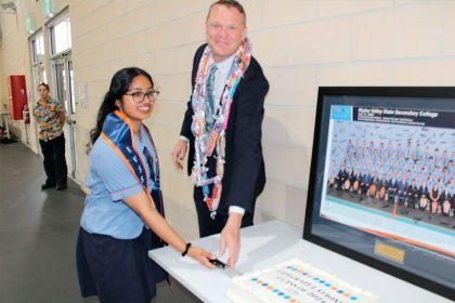 Christy Joseph & Principal Brendan Krueger.