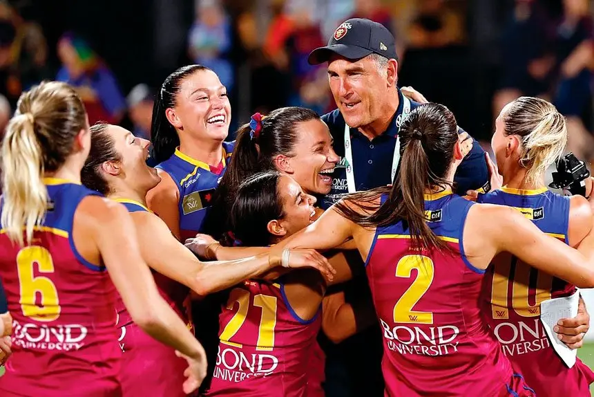 THANKS COACH: Head coach Craig Starcevich celebrates with his Grand Final bound Lions.