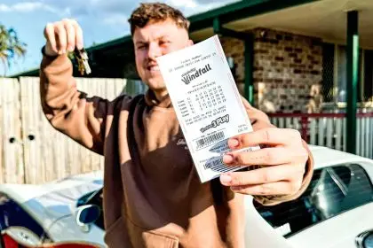WINNERS ARE GRINNERS: A Lotto draw changes a life.