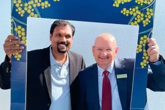 Federal Member for Blair Shayne Neumann welcomes a new citizen to the country at a recent Citizenship ceremony.