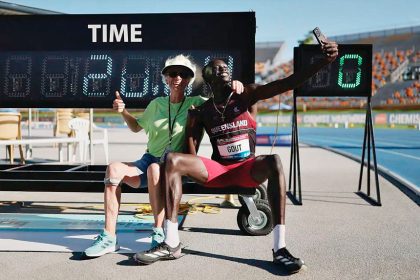 FAST LANE: Teen sensation Gout Gout with coach Diane Sheppard.