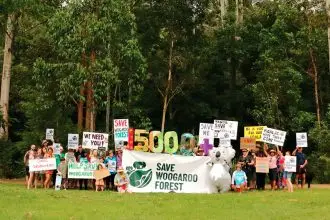 UNITED STAND: Save Woogaroo Forest members recently gathered at the site of the proposed development.