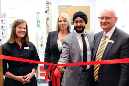 Cutting the ribbon at Ipswich Medicare Urgent Care Clinic last year
