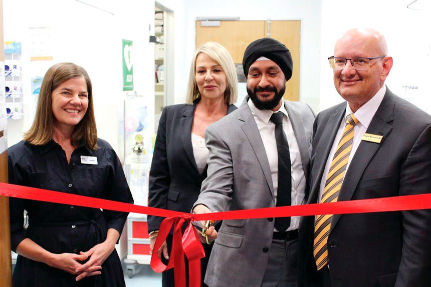 Cutting the ribbon at Ipswich Medicare Urgent Care Clinic last year