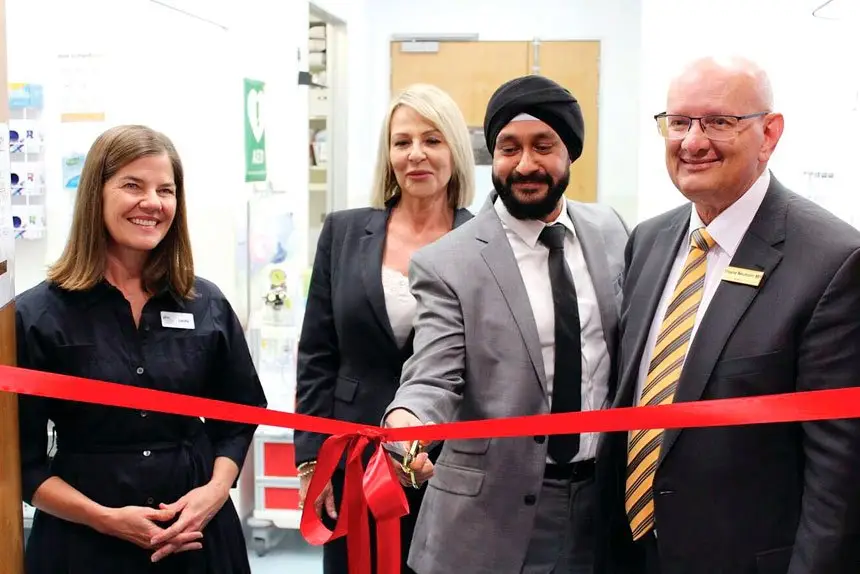 Cutting the ribbon at Ipswich Medicare Urgent Care Clinic last year