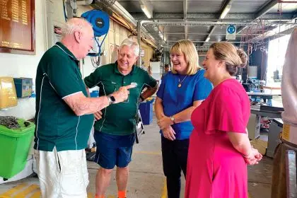 TEAMWORK: Ipswich Mayor Teresa Harding, far right, with Minister Ann Leahy and Men’s Shed members.