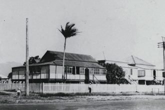 THE WAY IT WAS: Older children were often relegated to sleeping in enclosed verandas, like on this house in Cairns in 1927. PHOTO: State Library Queensland
