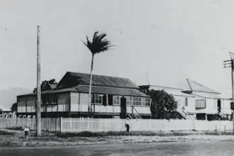 THE WAY IT WAS: Older children were often relegated to sleeping in enclosed verandas, like on this house in Cairns in 1927. PHOTO: State Library Queensland