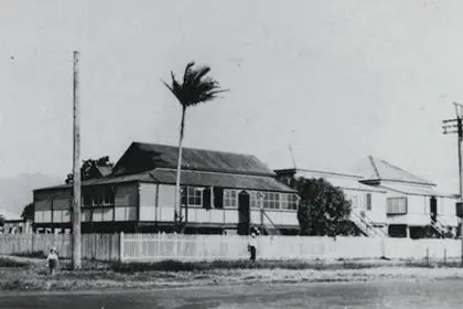 THE WAY IT WAS: Older children were often relegated to sleeping in enclosed verandas, like on this house in Cairns in 1927. PHOTO: State Library Queensland