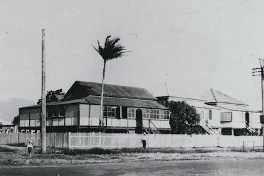 THE WAY IT WAS: Older children were often relegated to sleeping in enclosed verandas, like on this house in Cairns in 1927. PHOTO: State Library Queensland