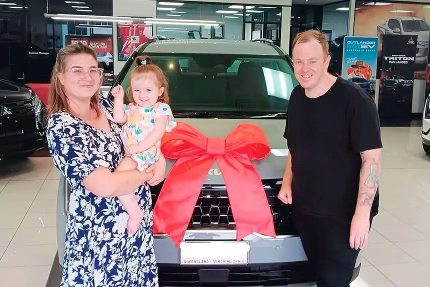 DRIVEN TO SUCCEED: Ava Tracey with mum and dad Rachel and Ben.