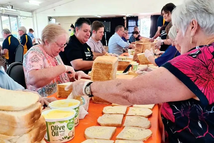 SPREADING KINDNESS: The team of volunteers at work making sandwiches.
