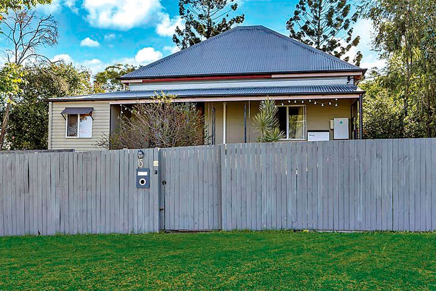 LOTS TO LIKE: High ceilings and timber flooring are just two of the many alluring aspects of this North Ipswich home.