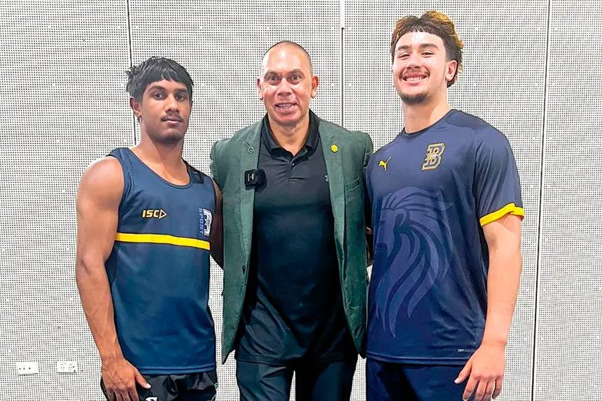 Bremer State High School and Ipswich Regional Sports Academy athletes Corbin Jeffries and Brayden Watcho with Patrick Johnson.