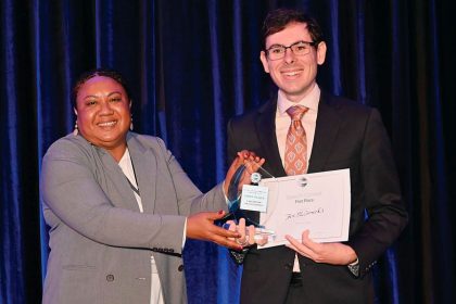 PROUD MOMENT: Ben McCormick receives his award.