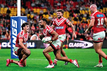 Hamiso Tabuai-Fidow of the Dolphins scores his second of four tries during the NRL Round 17 match between the Dolphins and the Rabbitohs. PHOTO: AAP Image/Dave Hunt