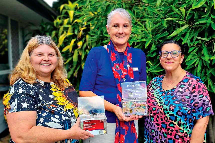 CEO Gail Rogers (centre) with supporters.