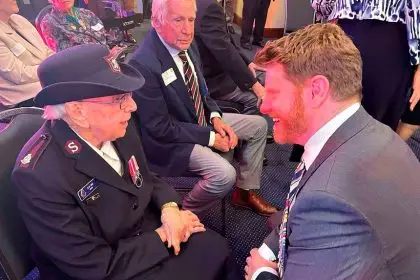 RARE HONOUR: Major Jean Bird meets Daniel Keighran VC at the event to celebrate those who served in World War II.