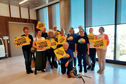 TIME TO ACT: Members of the Ipswich Climate Action Group descend on Ipswich City Council chambers last week.